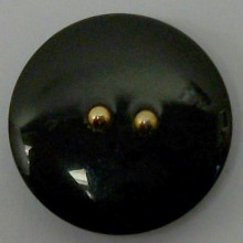 Botón negro, con dos bolas...